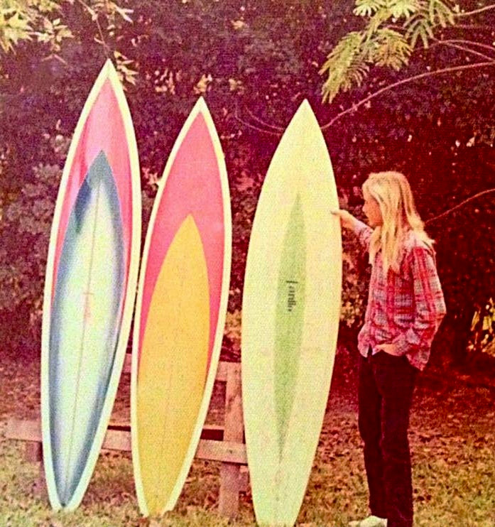 David Swenson author of Only Dead Fish Go With The Flow - admiring the surfboards for the El Salvador trip, 1972
